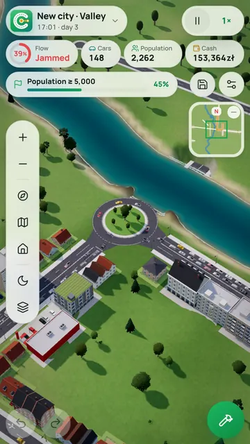 A growing riverside city in the Valley biome, with a roundabout and new neighbourhoods